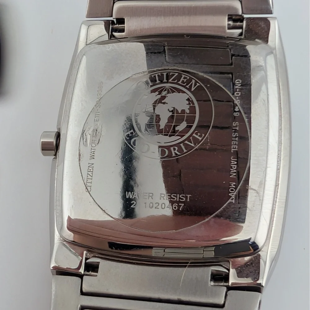 Citizen Eco-Drive E111-S049385 Tonneau Black Dial SS Men's Watch Box Papers
